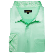 mint green shirt