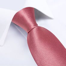 pink tie with black suit