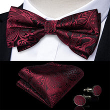 black suit red bow tie