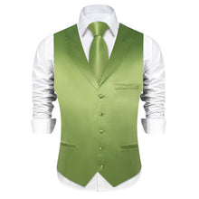 green vest and tie